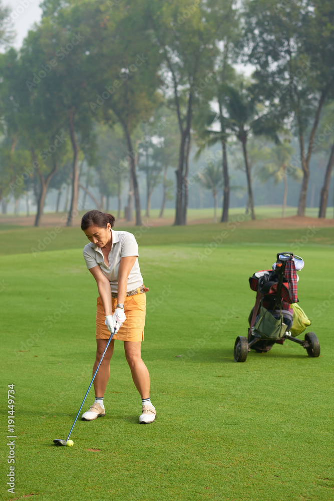 Playing golf Playing golf