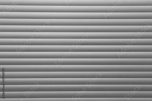 gradient line pattern of aluminium roller shutter door abstract for background