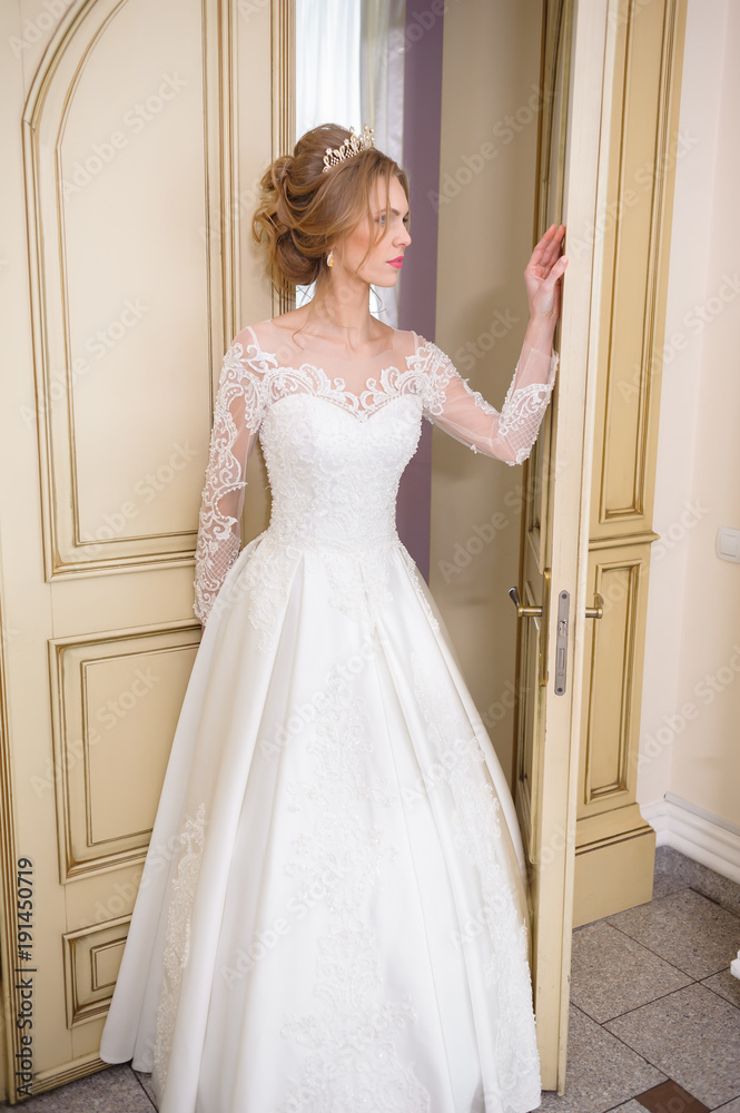 Beautiful bride in white interior Beautiful bride in white interior