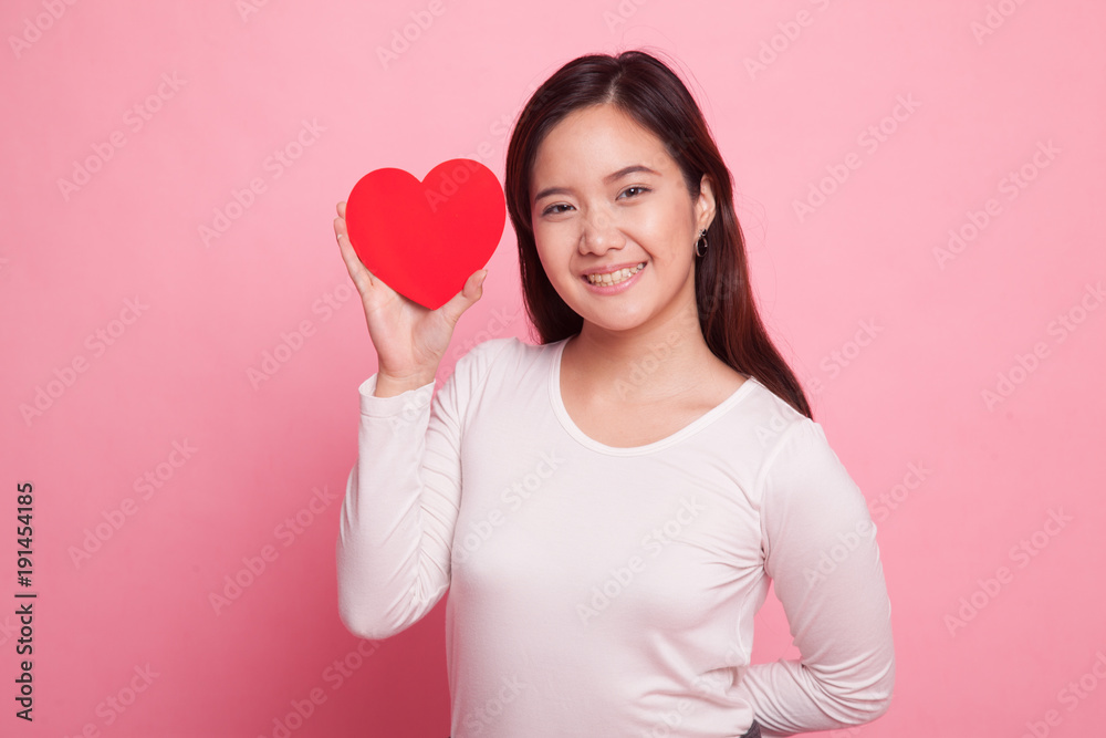 Asian woman with red heart. Asian woman with red heart.
