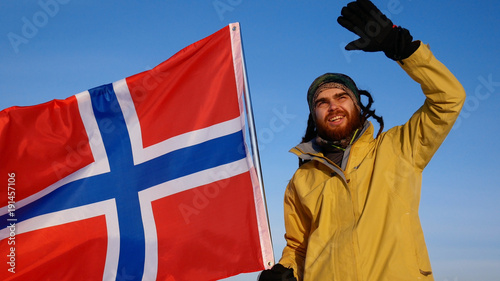 Norwegian fan with a flag, supports his team