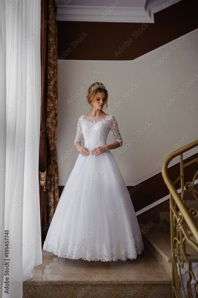 Fototapeta premium Beautiful bride in wedding dress