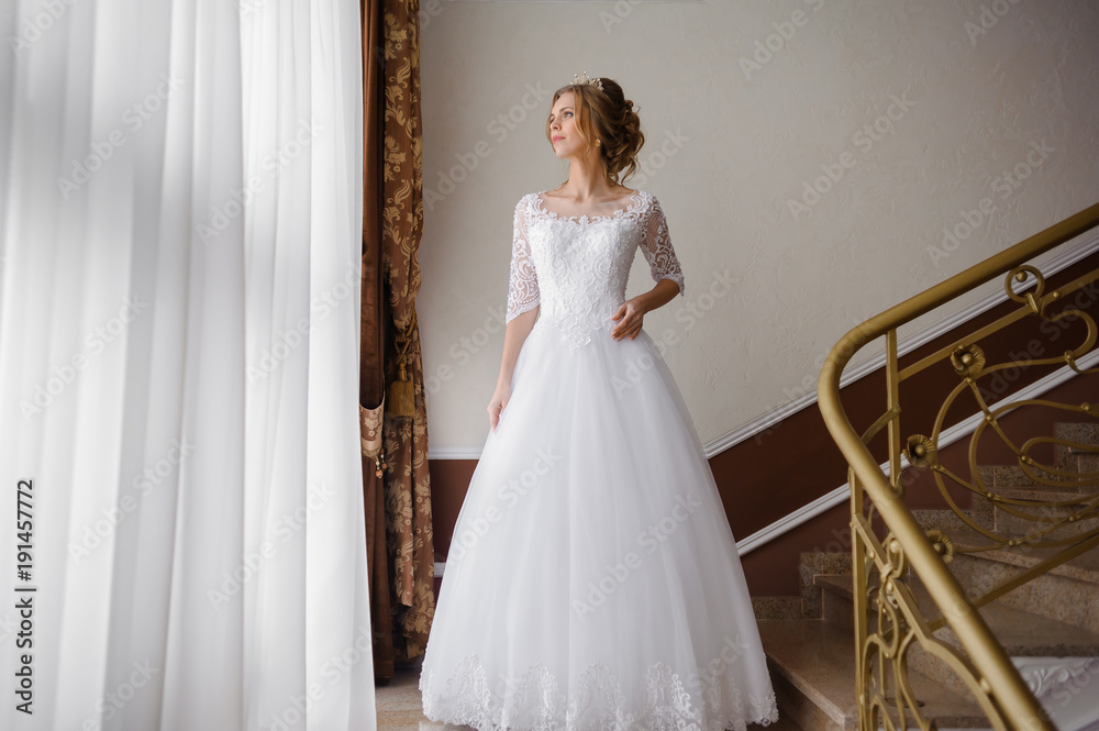 Fototapeta premium Beautiful bride in wedding dress