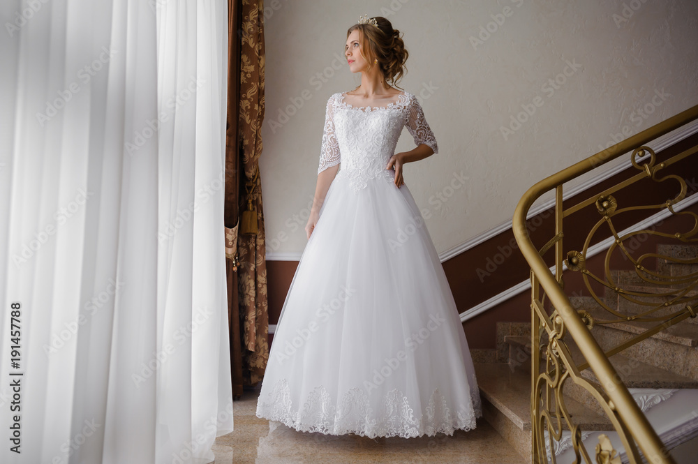 Fototapeta premium Beautiful bride in wedding dress