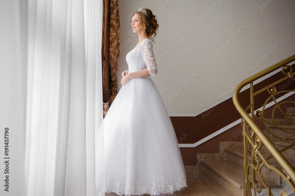 Fototapeta premium Beautiful bride in wedding dress