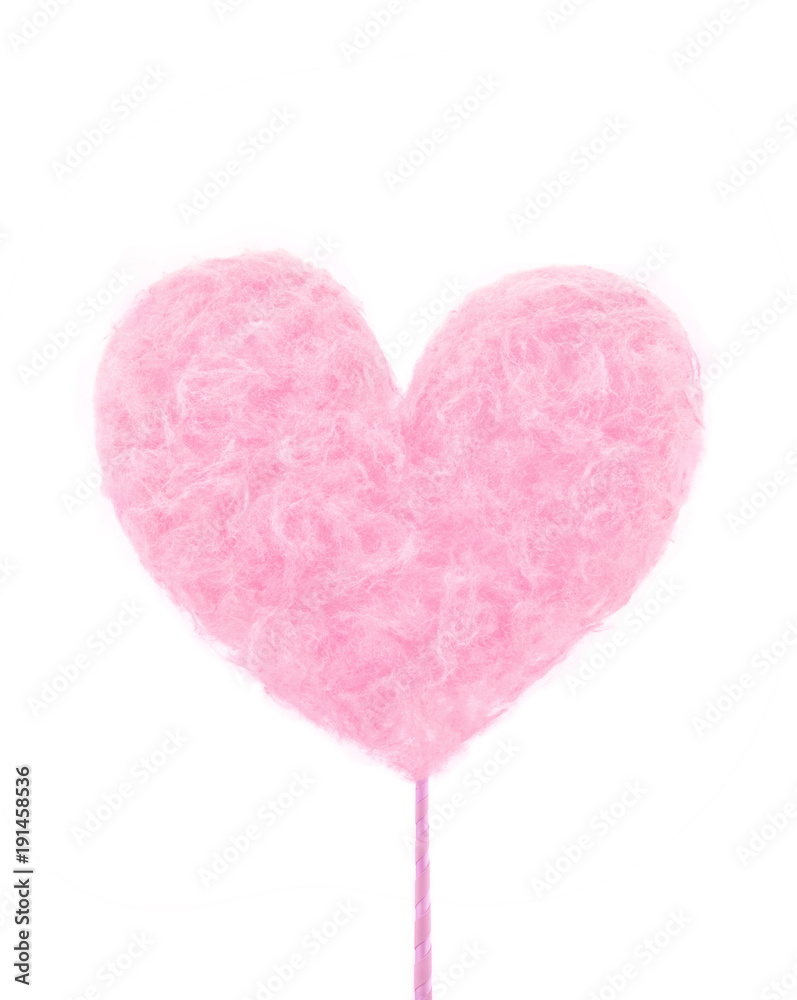 Pink delicious heart made of sweet cotton candy isolated on white background. Trendy minimal art style.