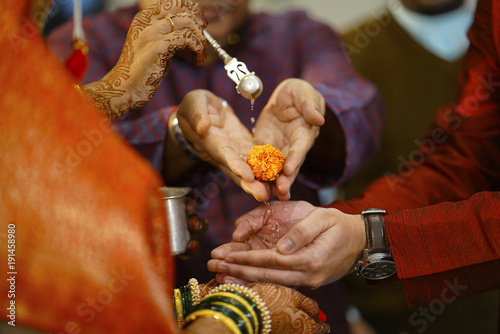 Water worship and offerings at Hindu marriage ritual