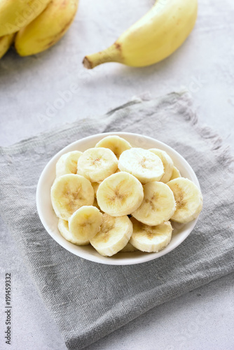 Sliced ripe banana in bowl