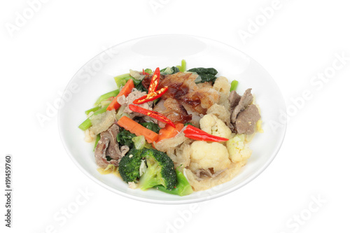 Isolated of Fried big noodle with chicken and vegetables.