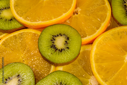 Background of the kiwi and orange fruits