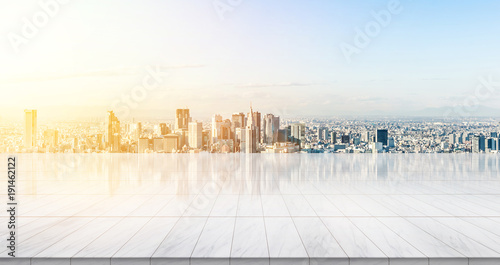 Canvas Print Business concept - Empty marble floor top with panoramic modern cityscape building bird eye aerial view under sunrise and morning bright sky of Tokyo, Japan, for display or montage product