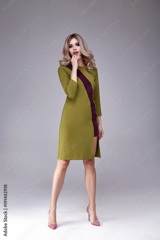 Fashion style woman perfect body shape blond hair wear silk dress code elegance casual beautiful model secretary air hostess diplomatic protocol office uniform stewardess business lady studio makeup. Fashion style woman perfect body shape blond hair wear silk dress code elegance casual beautiful model secretary air hostess diplomatic protocol office uniform stewardess business lady studio makeup.
