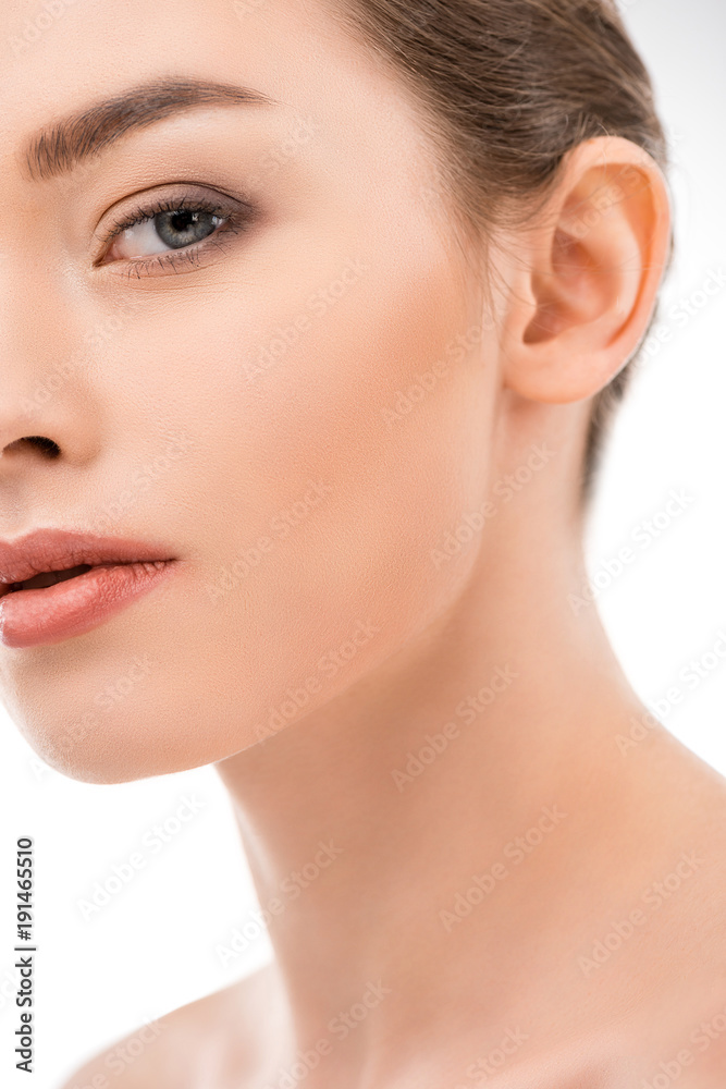 beautiful young woman with clean skin looking at camera, isolated on white beautiful young woman with clean skin looking at camera, isolated on white