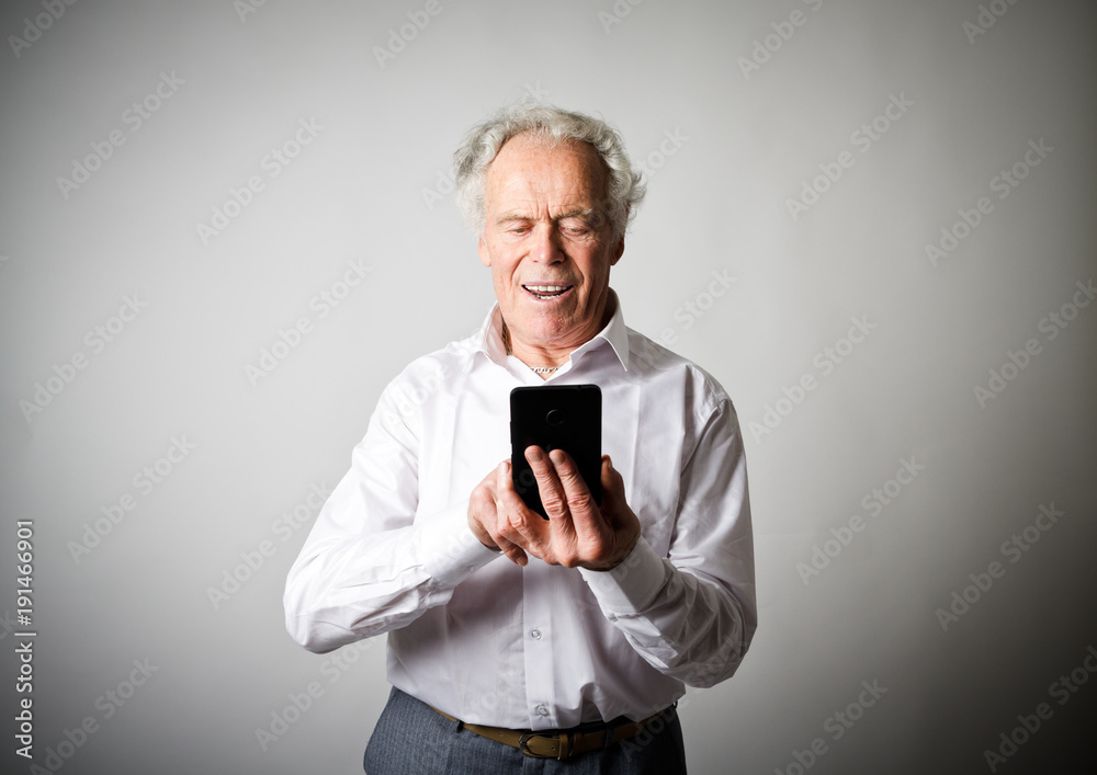 Old man and smart phone. Old man and smart phone.