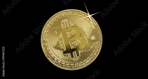 Golden bitcoin on black bac...
