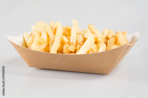 cardboard box chips French fries in takeaway dish of snack