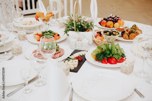 Family lunch with potato and salad.