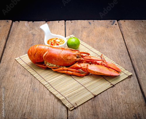 canadian lobster on wooden background