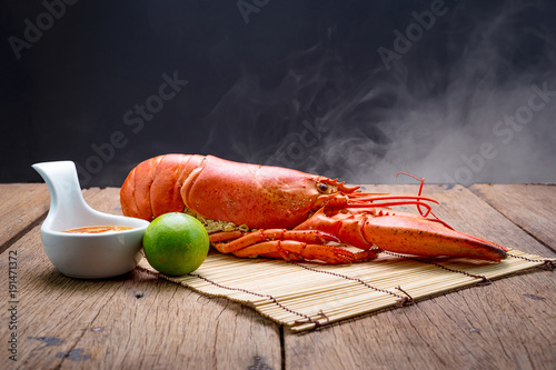 canadian lobster on wooden background