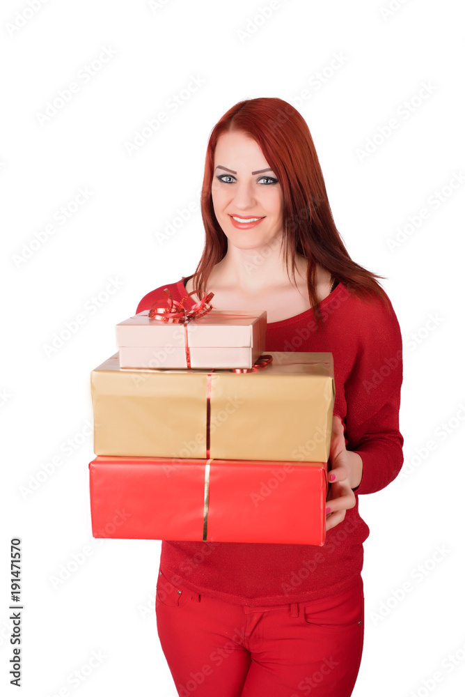 Cheerful woman holding small gift box isolated on a white background Cheerful woman holding small gift box isolated on a white background