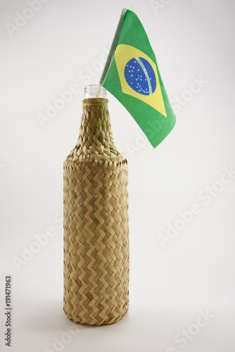 Cachaca bottle brazilian liquor and flag