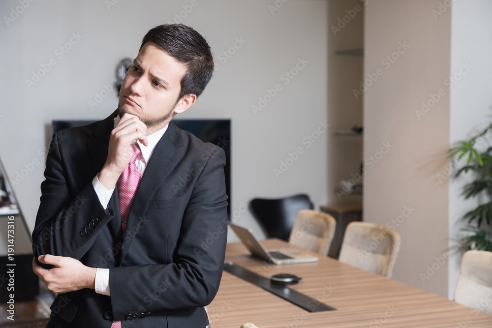 Businessperson having questions. Businessperson having questions.