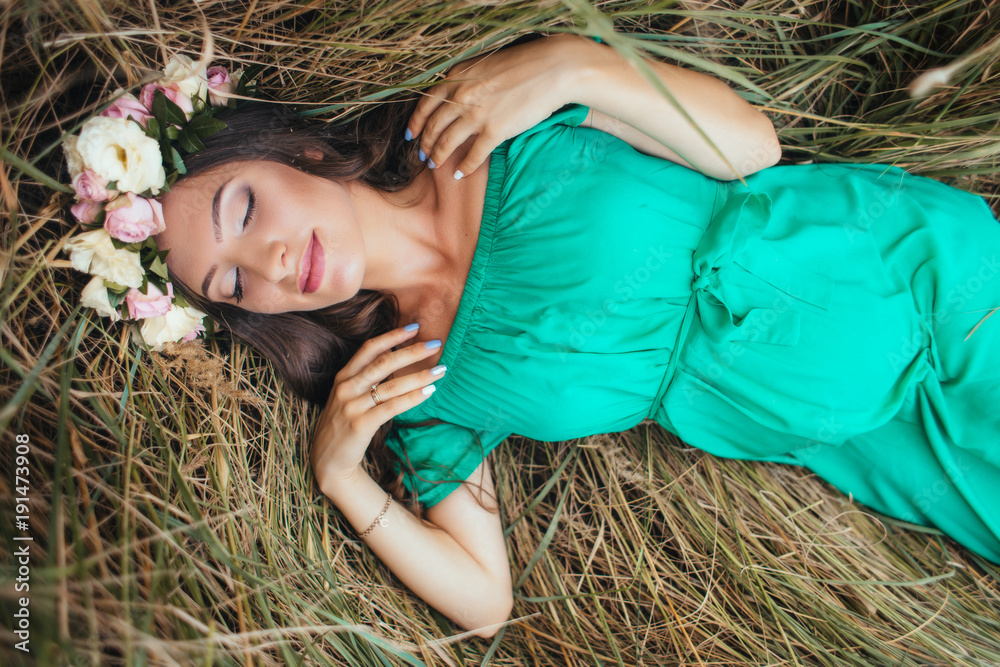 The future mother lies on the grass The future mother lies on the grass