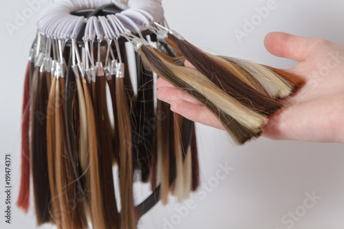 palette of samples of colored hair of various shades