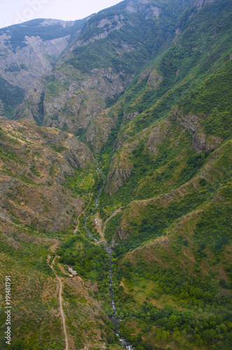 A view from above of the mountains and gorge of the Vorotan River. Cableway Wings of Tatev, Armenia.