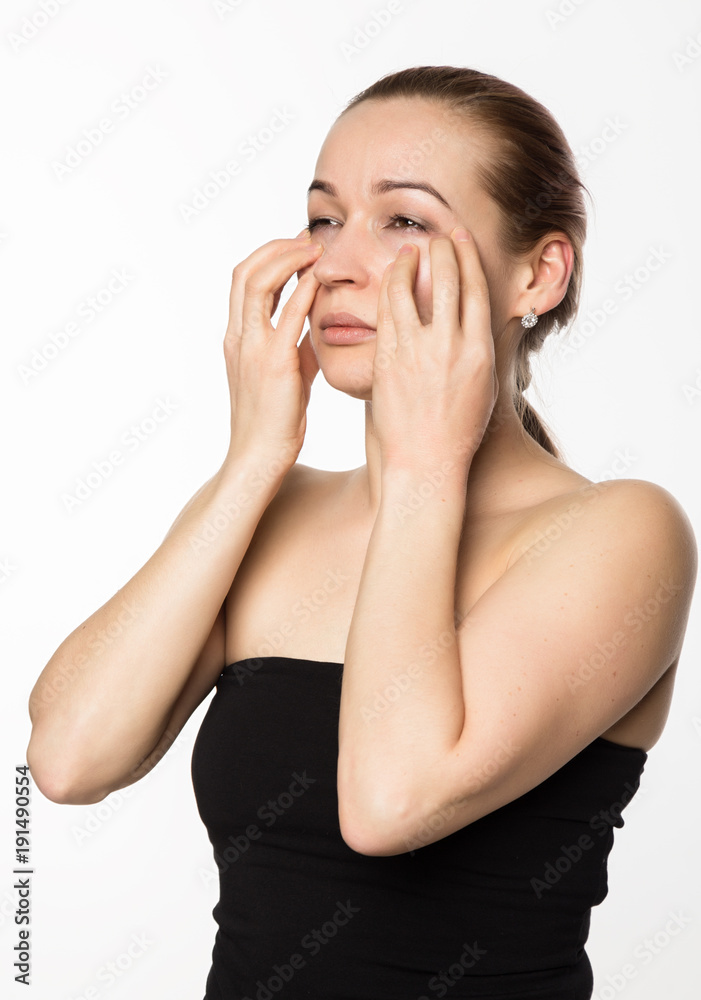 gymnastics for a face, woman doing anti-aging exercises. beauty and health concept gymnastics for a face, woman doing anti-aging exercises. beauty and health concept