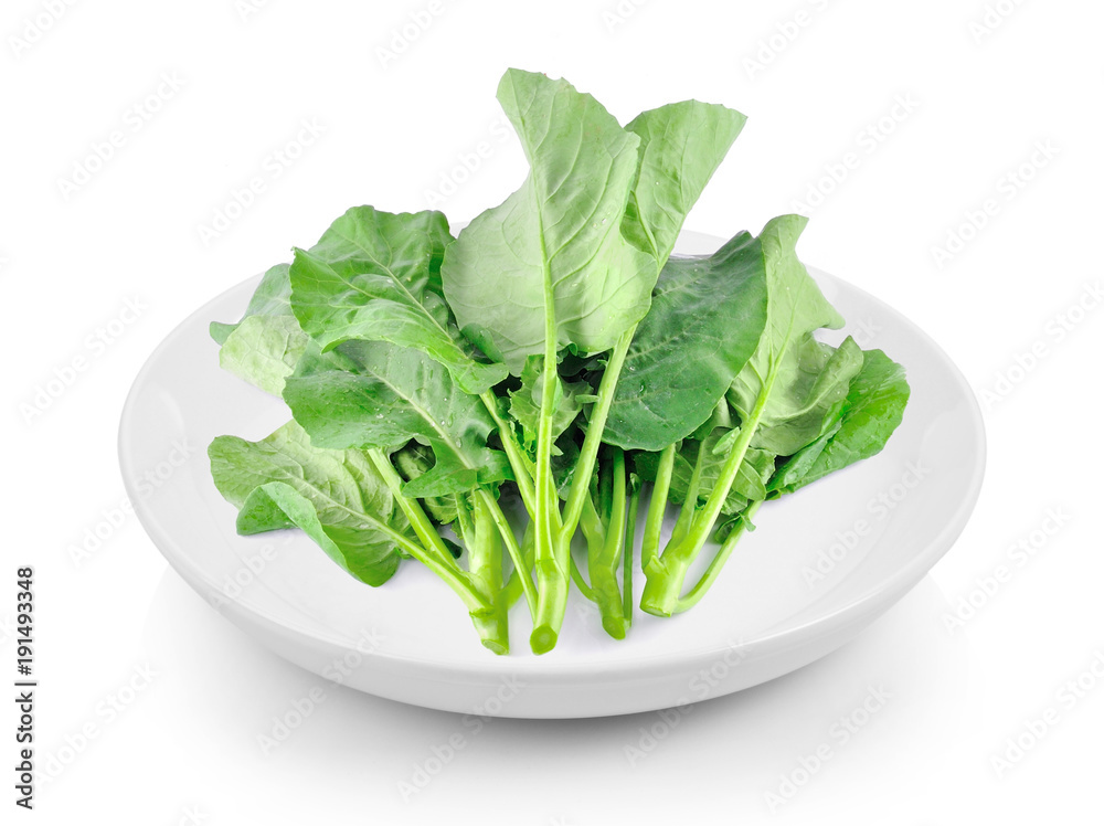Chinese kale in plate on white background Chinese kale in plate on white background