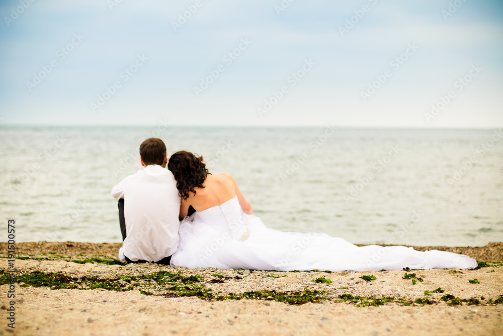 Newly Wedded On The Beach