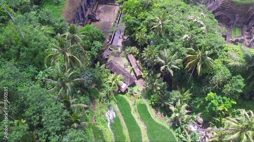 Aerial drone shot of gunung Kawi temple complex and surrounding farms photo