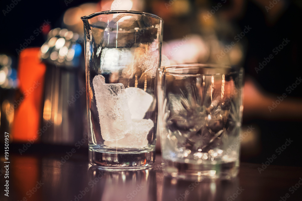 Glass cup crystal silverware cold bar ice transparent bokeh liquid whisky bartending food vodka tequila Glass cup crystal silverware cold bar ice transparent bokeh liquid whisky bartending food vodka tequila