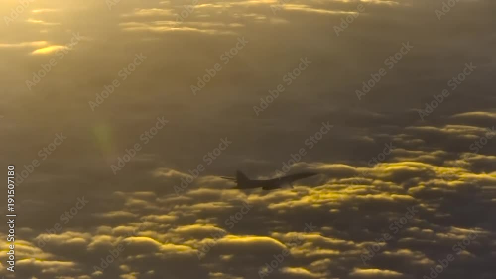 Plane on a background of yellow clouds Plane on a background of yellow clouds