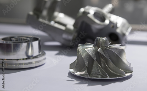 Steel impeller for Turbo charger  , component parts for diesel engine ; made from steel casting  loss wax and machining process ;industrial background