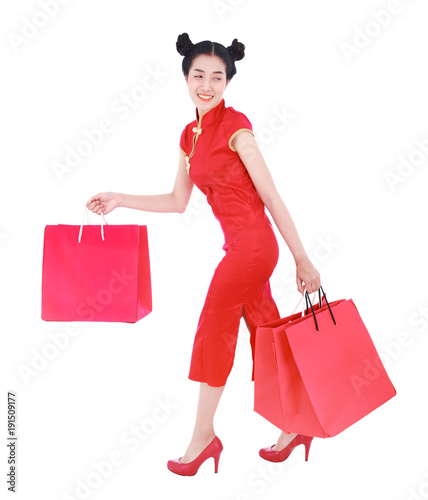 woman holding shopping bag on chinese new year celebration isolated on white background