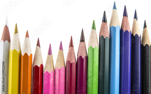 Sharpened colored pencils on the white background