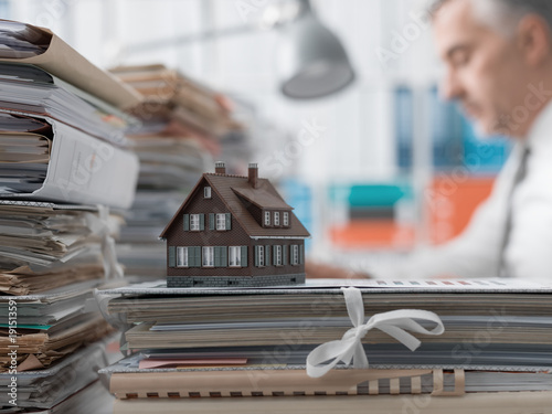 Real estate, mortgage loans and paperwork © stokkete