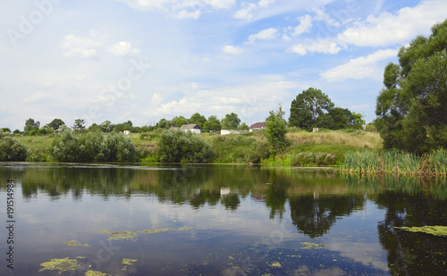 Fototapeta Naklejka Na Ścianę i Meble -  Summer landscape with river.River Krasivaya Mecha in Tula region,Russia.Countryside scene.Village.Abandoned house.