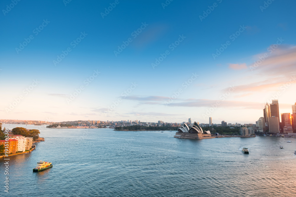 Top view Sydney Australia city skyline at circular quay ferry terminal with cloudy blue sky