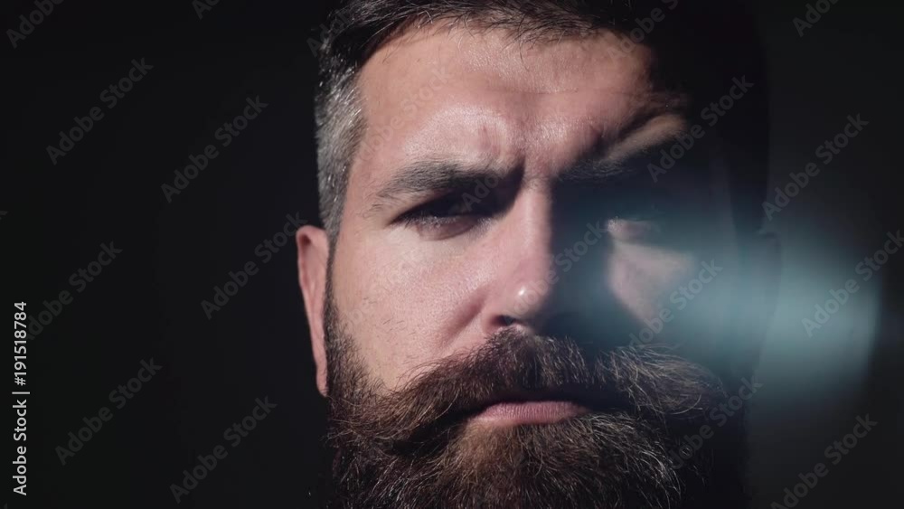 Handsome young bearded businessman in classic suit is adjusting his jacket . Bearded man with different emotions. Handsome young bearded businessman in classic suit is adjusting his jacket . Bearded man with different emotions.