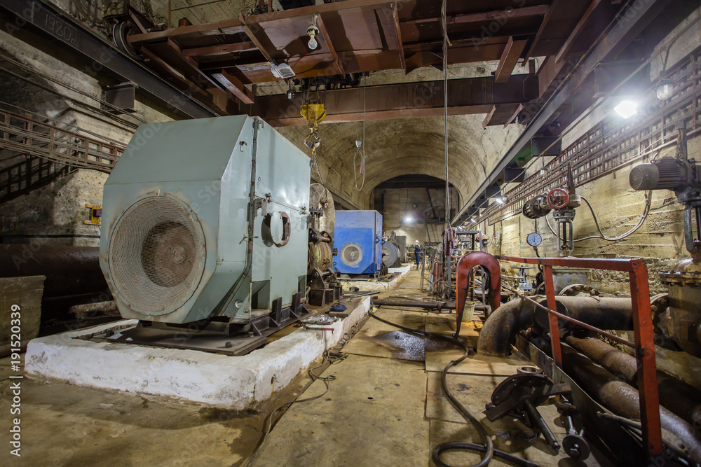Underground abandoned ore mine shaft tunnel gallery water pumping station pumpset
