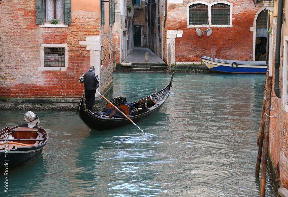 Venice Italy the water way with gondola and a man
