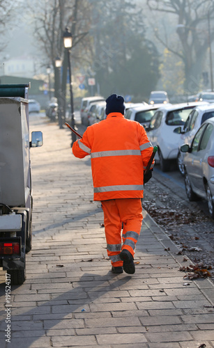 sweeper that cleans the streets of a big city