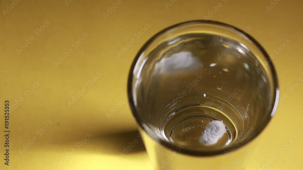 Glass of water with drugs and pills in it. FullHD Footage
Glass of water with drugs and pills in it. FullHD Footage