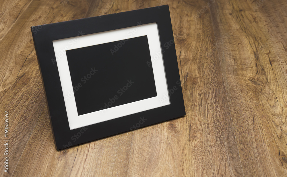 photo frame on a wooden table