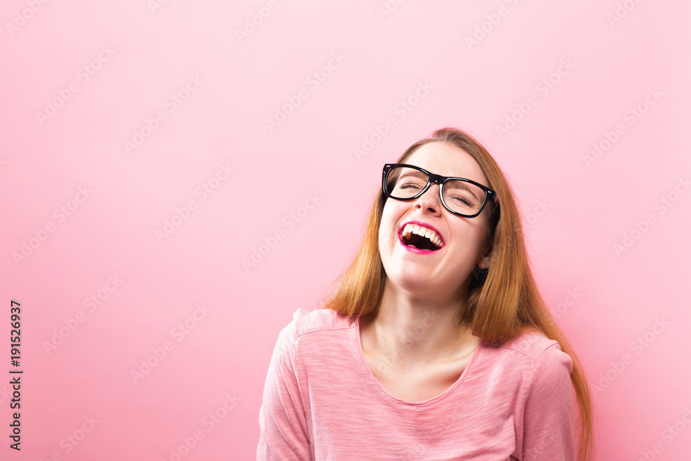 Happy young woman on a solid background Happy young woman on a solid background