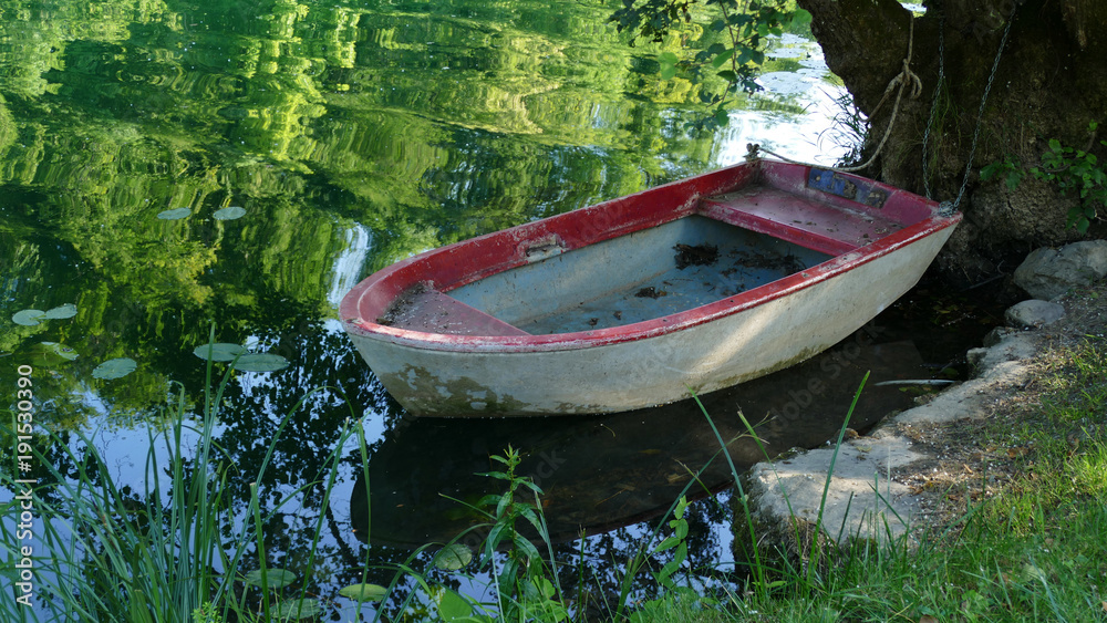 Boat on the river in green nature Boat on the river in green nature