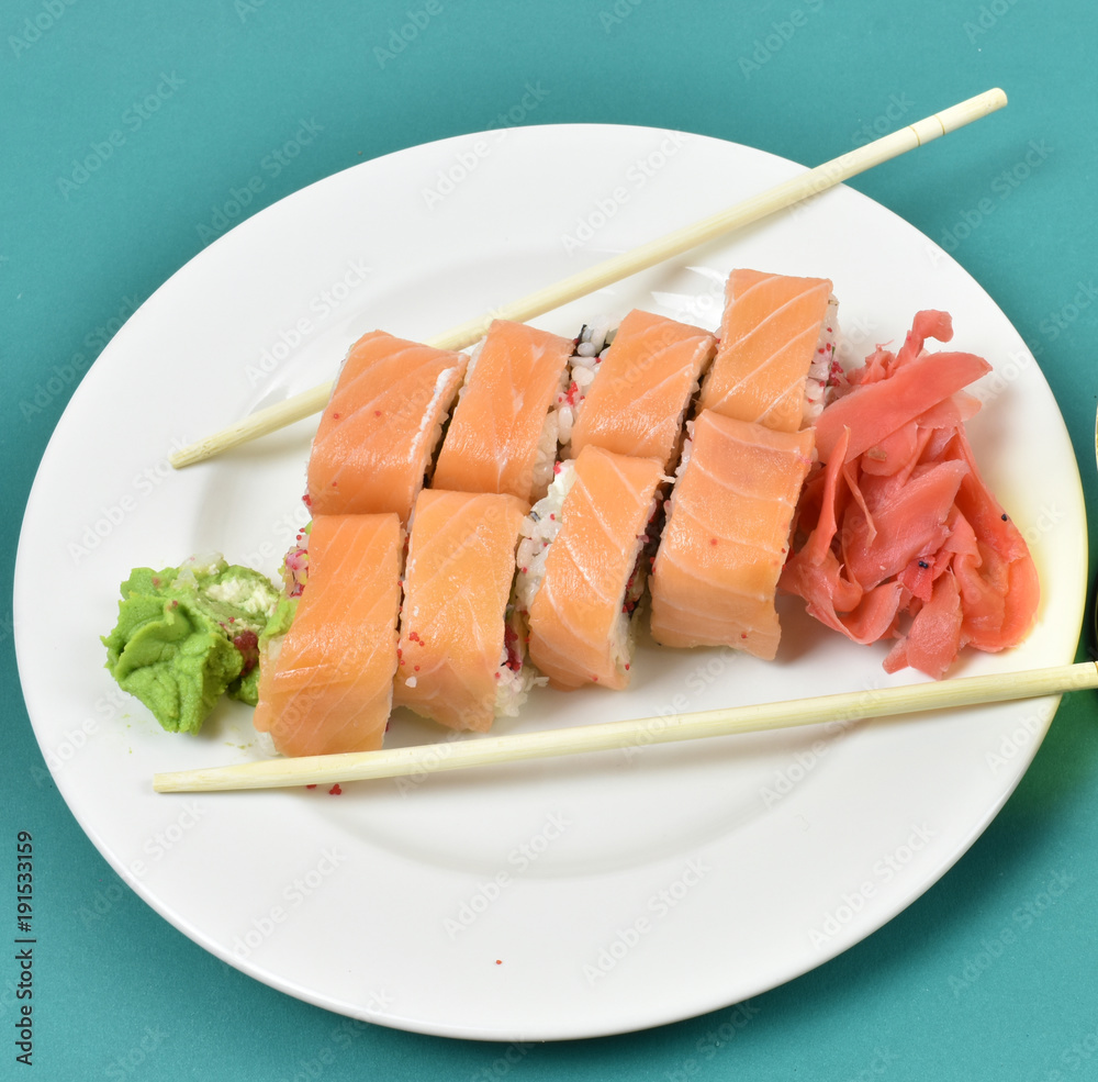 Rolls in a plate on a green table Rolls in a plate on a green table